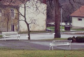 white benches in the town