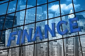 Finance sign on the window of the building