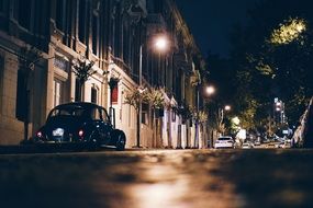 retro car near the house at night