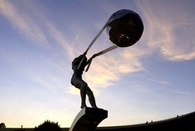 statue of a girl with a ball in Singapore