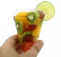 champagne with fruit in a glass