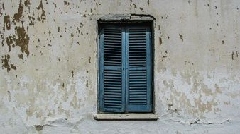 old blue shutters on window, Cyprus, Xylotymbou