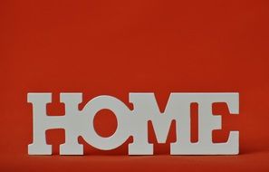 word home on a red background