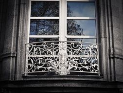 beautiful patterned railings by the window