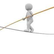 man goes on a rope on a white background