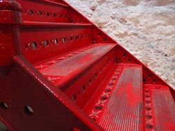 red metal staircase close-up