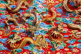 golden Dragons at colorful background, asian ornament