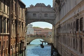 bridge between buildings, italy, venice