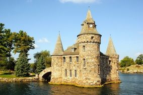 stone castle on water in canada