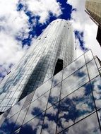 clouds reflected in a skyscraper in frankfurt