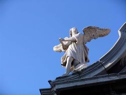 sculpture of angel on a building