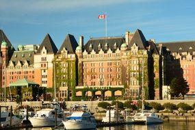 view from the harbor to the empress victoria hotel in british columbia