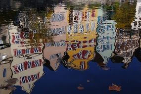 reflection of houses on the water in tubingen