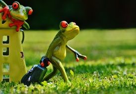 traveling frog as a colorful figurine