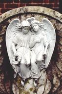 two angels on a tombstone