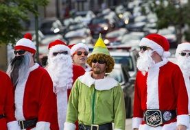 People wearing Christmas costumes