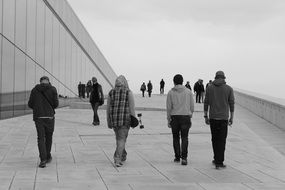 piople walking by pavement at mirroring wall, Modern Architecture