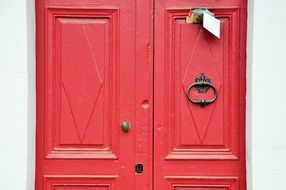 red doors with doorknob