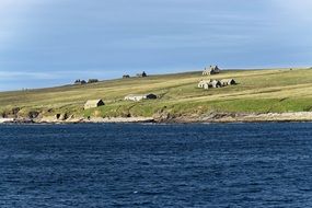 distant view of the ruins along the coastline