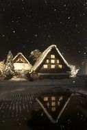 country houses on a snowy night background in Shirakawa