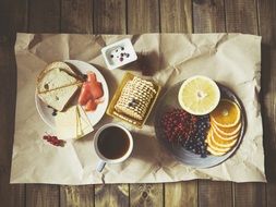 delicious healthy breakfast on paper on table