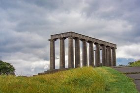 National Monument on a green hill in Scotland