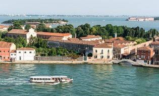 pleasure boat on the background of Venice