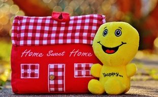 soft toy pillow of home sweet home and yellow man happy