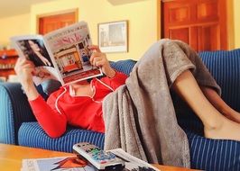 girl reading on the sofa