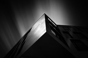 modern building with mirror glass in the dark