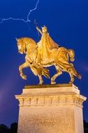 golden statue french king louis IX