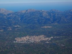 Aerial View of villages in beautiful mountain landscape at sea, spain, Mallorca