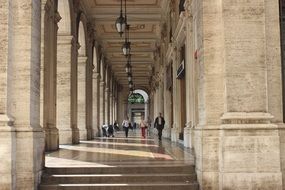 people walking in Arcade, Italy, Genoa