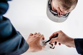 electrician repairing the socket