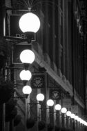 Black and white photo of the street lights in London