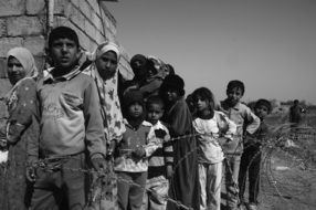 black and white photo of children of war