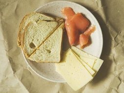 breakfast with cheese on a white plate