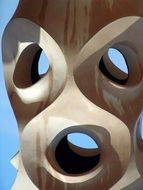 totem pole with holes close up