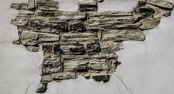 damaged top layer on the wall