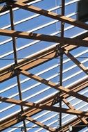 metal beams and glass roof of the building