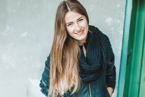 portrait of a young woman in an abandoned building