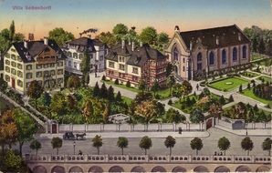 postcard with villa Zekendorf among the colorful plants