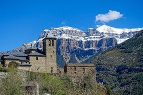 landscape of stone buildings on a mountains in the pyrenees