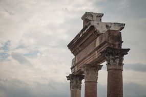 cloudy sky over the ruins of a greek temple