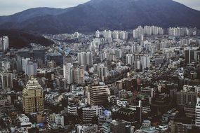 Downtown with the Skyscraper with the mountains behind