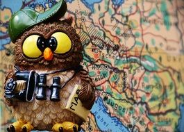 owl figure near the card