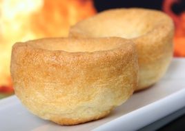 Baked buns on the white plate in Britain