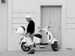 Scooter Vespa, Man Walking beside