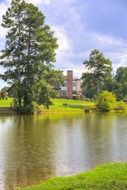 landscape of house near a pond