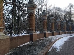 fence with columns near the cathedral in St. Petersburg